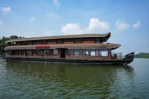 Traditional houseboat in Kollam, Kerala with modern design and comfort – JK Royal Cruise