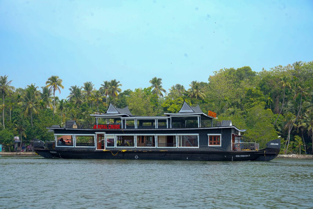Traditional houseboat in Kollam, Kerala with modern design and comfort – JK Royal Cruise
