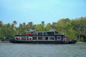 Traditional houseboat in Kollam, Kerala with modern design and comfort – JK Royal Cruise