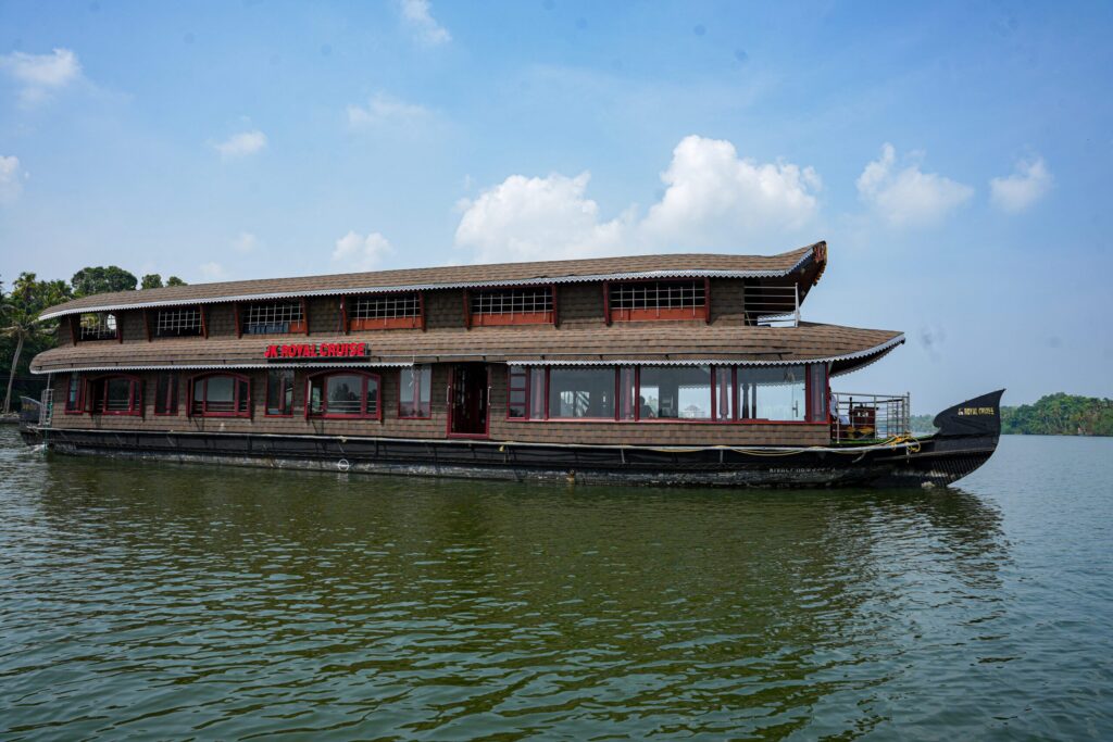Traditional houseboat in Kollam, Kerala with modern design and comfort – JK Royal Cruise