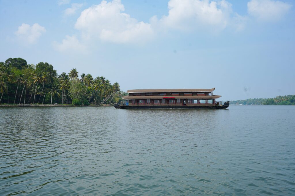 Traditional houseboat in Kollam, Kerala with modern design and comfort – JK Royal Cruise
