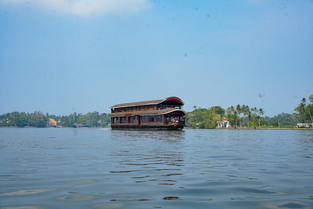 Traditional houseboat in Kollam, Kerala with modern design and comfort – JK Royal Cruise