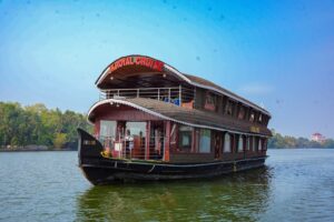 Traditional houseboat in Kollam, Kerala with modern design and comfort – JK Royal Cruise
